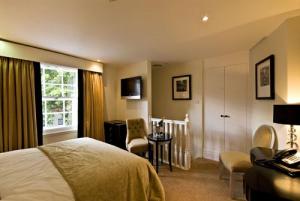 The Bedrooms at The Tophams Hotel