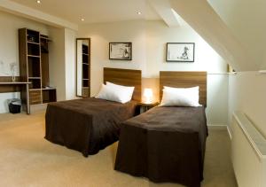 The Bedrooms at Avni Kensington Hotel