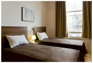 The Bedrooms at Avni Kensington Hotel